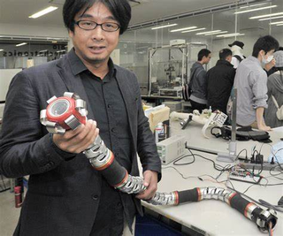 Dr. Eki proudly shares his award Thursday morning with the Subaru Transmission Engineering Team.